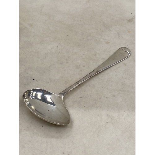 51 - THREE PIECES OF HALLMARKED SILVER TO INCLUDE A BIRMINGHAM NAPKIN RING AND TWO SHEFFIELD SPOONS