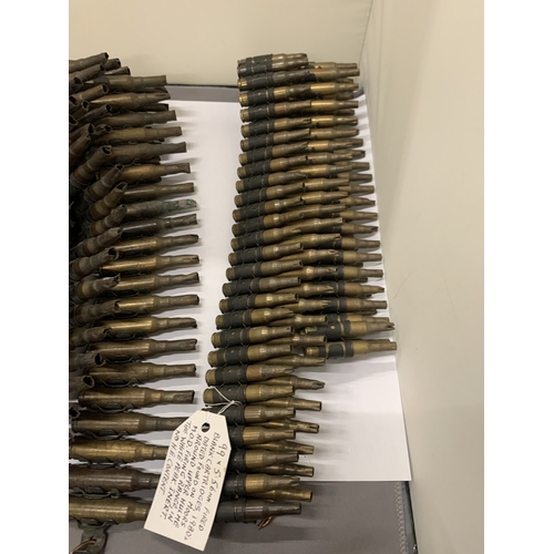 303 - A COLLECTION OF THREE FIRED MACHINE GUN BELTS WITH PROVENANCE