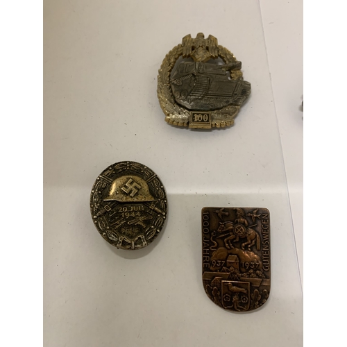 304 - A COLLECTION OF FIVE ASSORTED GERMAN WAR BADGES