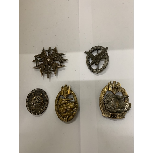 307 - A COLLECTION OF FIVE ASSORTED GERMAN WAR BADGES
