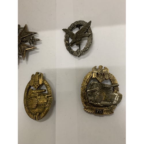 307 - A COLLECTION OF FIVE ASSORTED GERMAN WAR BADGES