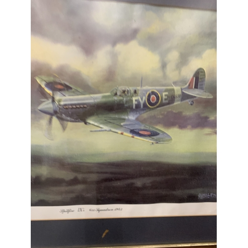 310 - A FRAMED AND GLAZED COLOURED PRINT OF A SPITFIRE, 44CM X 60CM