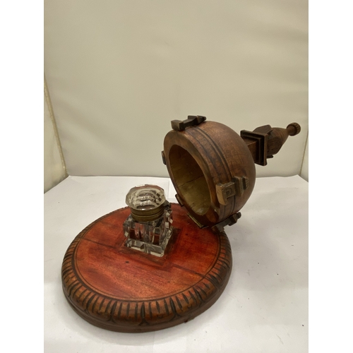 11 - AN INKWELL UNDER A NEPALESE TEMPLE