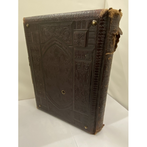 13 - A VICTORIAN LEATHER MUSICAL PHOTO ALBUM CONTAINING PHOTOS, WITH KEY (KEY IN OFFICE)