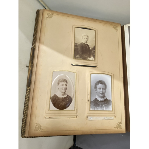 13 - A VICTORIAN LEATHER MUSICAL PHOTO ALBUM CONTAINING PHOTOS, WITH KEY (KEY IN OFFICE)