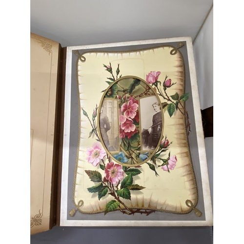 13 - A VICTORIAN LEATHER MUSICAL PHOTO ALBUM CONTAINING PHOTOS, WITH KEY (KEY IN OFFICE)