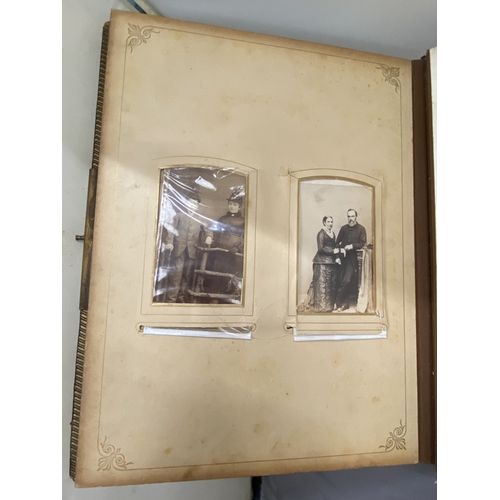 13 - A VICTORIAN LEATHER MUSICAL PHOTO ALBUM CONTAINING PHOTOS, WITH KEY (KEY IN OFFICE)