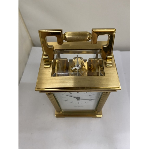 16 - A VINTAGE WOODFORD BRASS CARRIAGE CLOCK, WITH KEY, WORKING AT TIME OF CATALOGUING