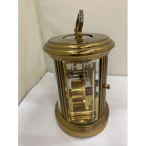 22 - A VINTAGE MATTHEW NORMAN OF LONDON, BRASS 8 DAY OVAL CARRIAGE CLOCK, WITH KEY, WORKING AT TIME OF CA... 