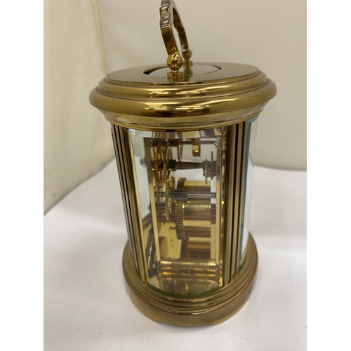 22 - A VINTAGE MATTHEW NORMAN OF LONDON, BRASS 8 DAY OVAL CARRIAGE CLOCK, WITH KEY, WORKING AT TIME OF CA... 