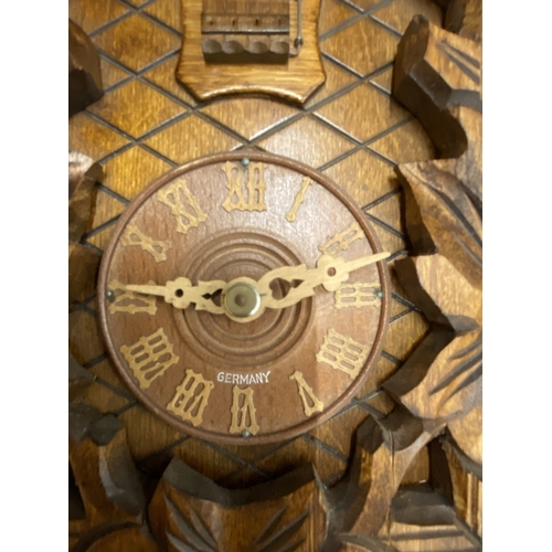28 - A GERMAN BLACK FOREST CUCKOO CLOCK