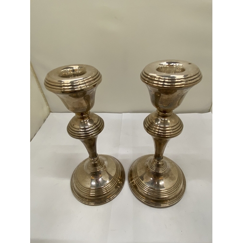 3 - A PAIR OF HALLMARKED BIRMINGHAM CANDLESTICKS WITH FILLED BASES, GROSS WEIGHT 697g