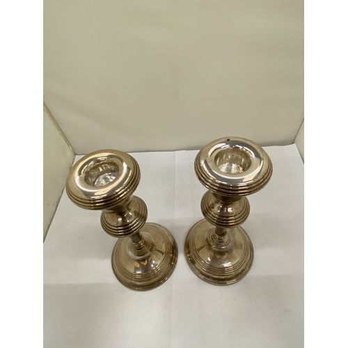 3 - A PAIR OF HALLMARKED BIRMINGHAM CANDLESTICKS WITH FILLED BASES, GROSS WEIGHT 697g