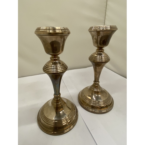 3 - A PAIR OF HALLMARKED BIRMINGHAM CANDLESTICKS WITH FILLED BASES, GROSS WEIGHT 697g