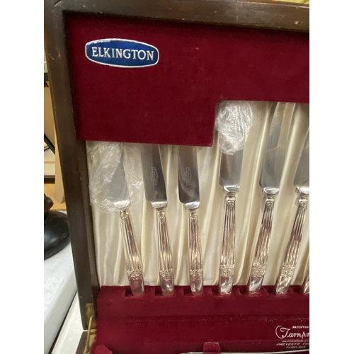 9 - A VINTAGE ELKINGTON CANTEEN OF CUTLERY IN A FITTED BURR WALNUT BOX