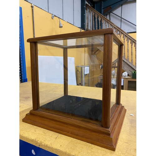 50 - A WOODEN FRAMED GLASS DISPLAY UNIT