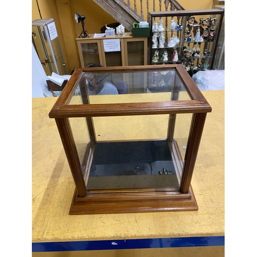 50 - A WOODEN FRAMED GLASS DISPLAY UNIT