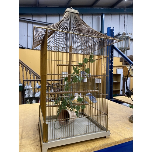 51 - A PAGODA STYLE METAL BIRD CAGE, HEIGHT 70CM
