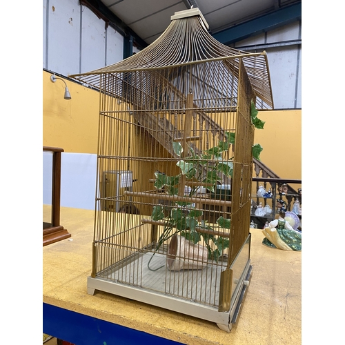 51 - A PAGODA STYLE METAL BIRD CAGE, HEIGHT 70CM