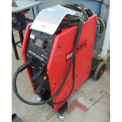 76 - A HYPERWELDING MIG500 SYNERGIC MIG WELDER WITH FOUR WHEELED TROLLEY BASE  NO VAT