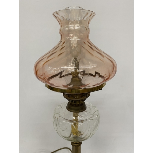 50A - A VICTORIAN STYLE LAMP IN THE MANNER OF AN OIL LAMP WITH GLASS SHADE AND CHIMNEY, HEIGHT APPROX 68CM