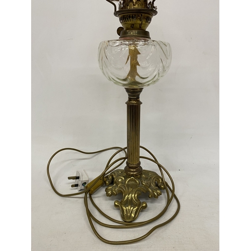 50A - A VICTORIAN STYLE LAMP IN THE MANNER OF AN OIL LAMP WITH GLASS SHADE AND CHIMNEY, HEIGHT APPROX 68CM