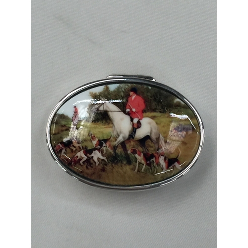 19 - A SILVER AND ENAMEL HUNTING SCENE PILL BOX