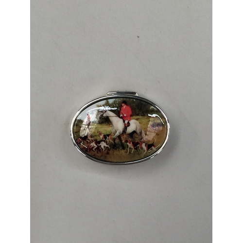 19 - A SILVER AND ENAMEL HUNTING SCENE PILL BOX