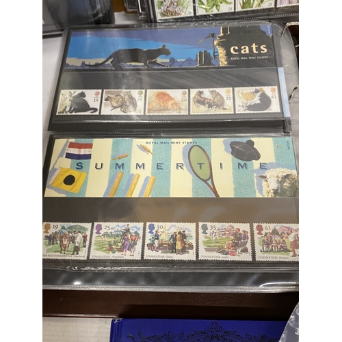 52 - A BOX CONTAINING THREE ROYAL MAIL PRESENTATION PACK ALBUMS PLUS A FILE BOX CONTAINING THE LINCOLN PO... 