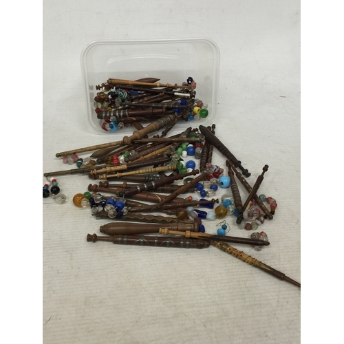 13 - A COLLECTION OF FIFTY SEVEN, 19TH CENTURY TURNED WOOD LACE BOBBINS, TO INCLUDE METAL MOUNTED, WIRE W... 