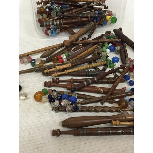 13 - A COLLECTION OF FIFTY SEVEN, 19TH CENTURY TURNED WOOD LACE BOBBINS, TO INCLUDE METAL MOUNTED, WIRE W... 