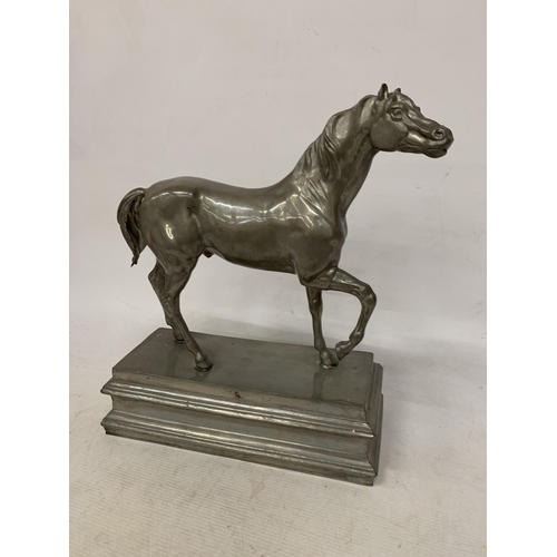 2 - A LARGE PEWTER MODEL OF A HORSE, ON A PLINTH, HEIGHT  37CM, WIDTH 31CM