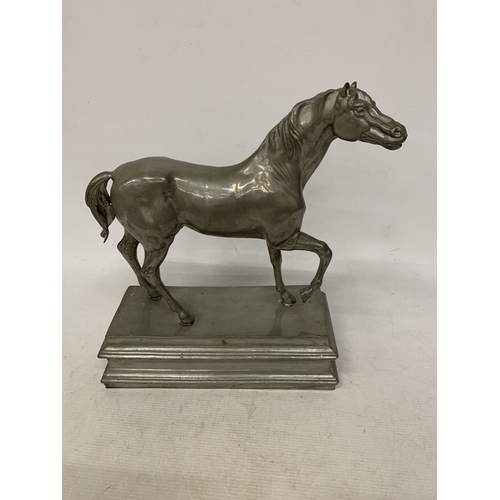 2 - A LARGE PEWTER MODEL OF A HORSE, ON A PLINTH, HEIGHT  37CM, WIDTH 31CM