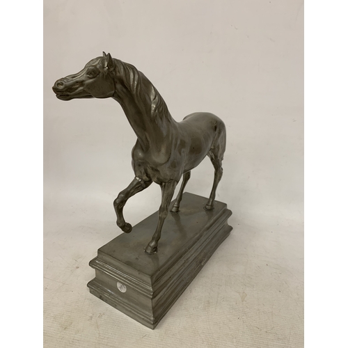 2 - A LARGE PEWTER MODEL OF A HORSE, ON A PLINTH, HEIGHT  37CM, WIDTH 31CM