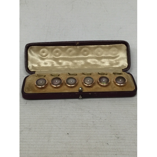 21 - A SET OF SIX GOLD PLATED AND MOTHER OF PEARL BUTTONS IN A PRESENTATION BOX