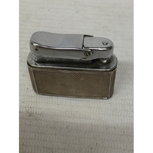 33 - A SILVER VINTAGE COLIBRI LIGHTER