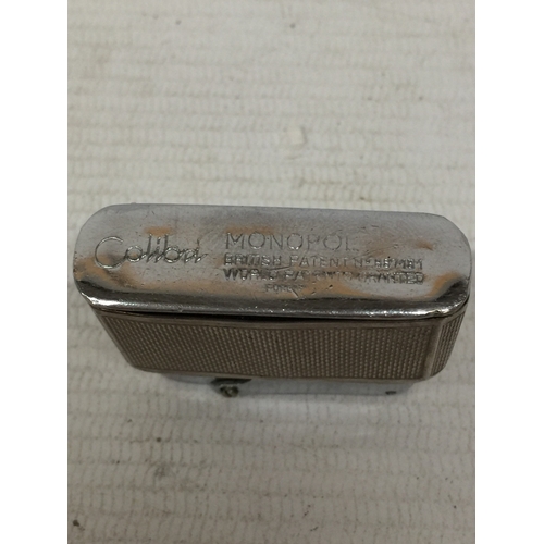 33 - A SILVER VINTAGE COLIBRI LIGHTER