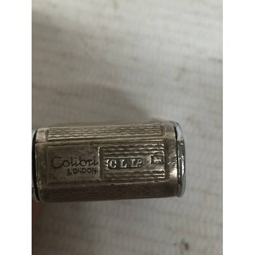 33 - A SILVER VINTAGE COLIBRI LIGHTER