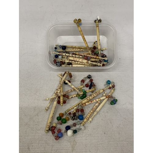 42 - A COLLECTION OF TWENTY NINE 19TH CENTURY, TURNED BONE NAMED LACE BOBBINS, EACH SPOT INSCRIBED WITH A... 