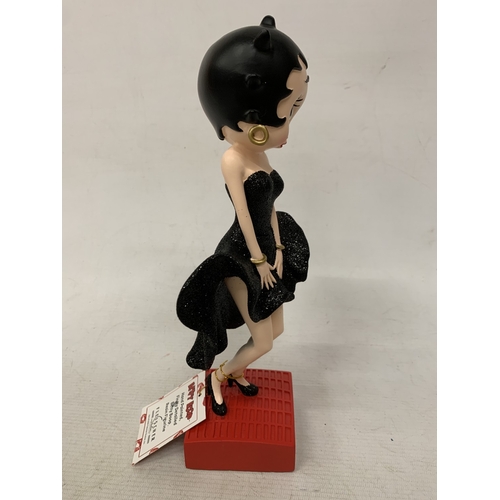 44 - A BETTY BOOP FIGURE IN A BLACK GLITTER DRESS, HEIGHT 29CM