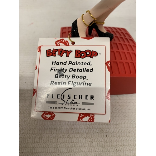 44 - A BETTY BOOP FIGURE IN A BLACK GLITTER DRESS, HEIGHT 29CM