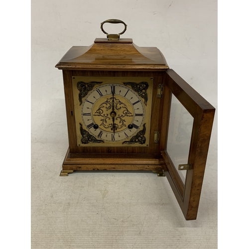 47 - A VINTAGE OAK  CASED CHIMING MANTLE CLOCK