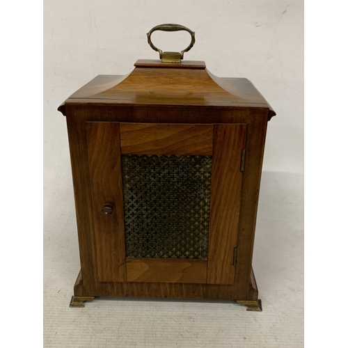 47 - A VINTAGE OAK  CASED CHIMING MANTLE CLOCK