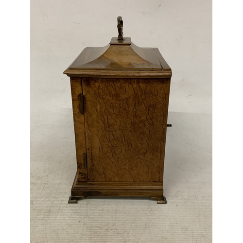 47 - A VINTAGE OAK  CASED CHIMING MANTLE CLOCK