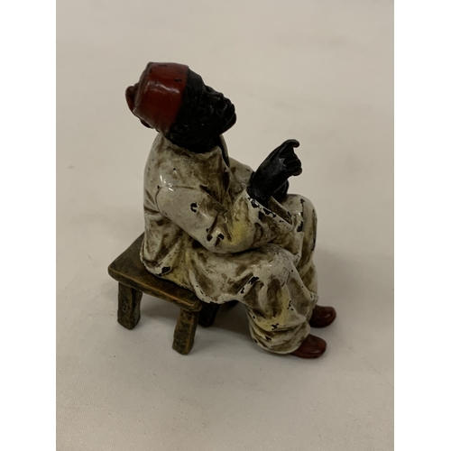 52 - A COLD PAINTED BERGMANN BRONZE OF A SEATED AFRICAN, HEIGHT 8CM
