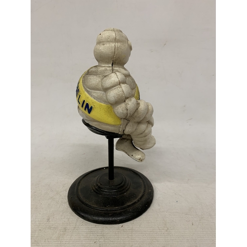 58 - A CAST SITTING MICHELIN MAN FIGURE, HEIGHT 29CM