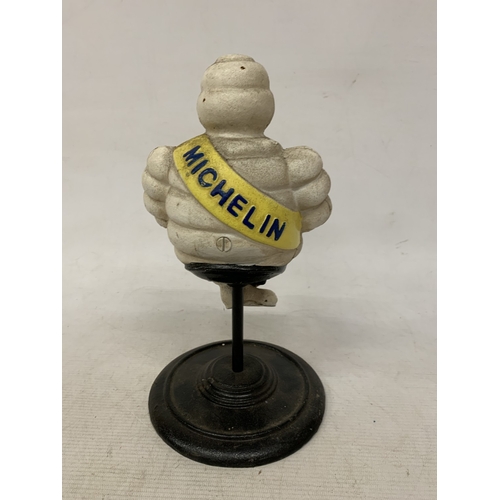 58 - A CAST SITTING MICHELIN MAN FIGURE, HEIGHT 29CM