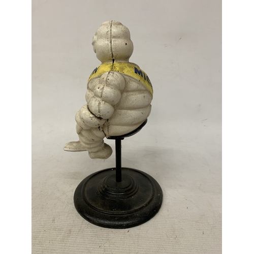 58 - A CAST SITTING MICHELIN MAN FIGURE, HEIGHT 29CM