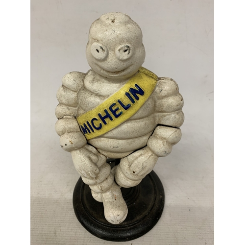 58 - A CAST SITTING MICHELIN MAN FIGURE, HEIGHT 29CM