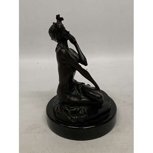 33 - A BRONZE SCULPTURE OF A WOMAN IN DRESS WITH PHONE ON A MARBLE BASE - SIGNED